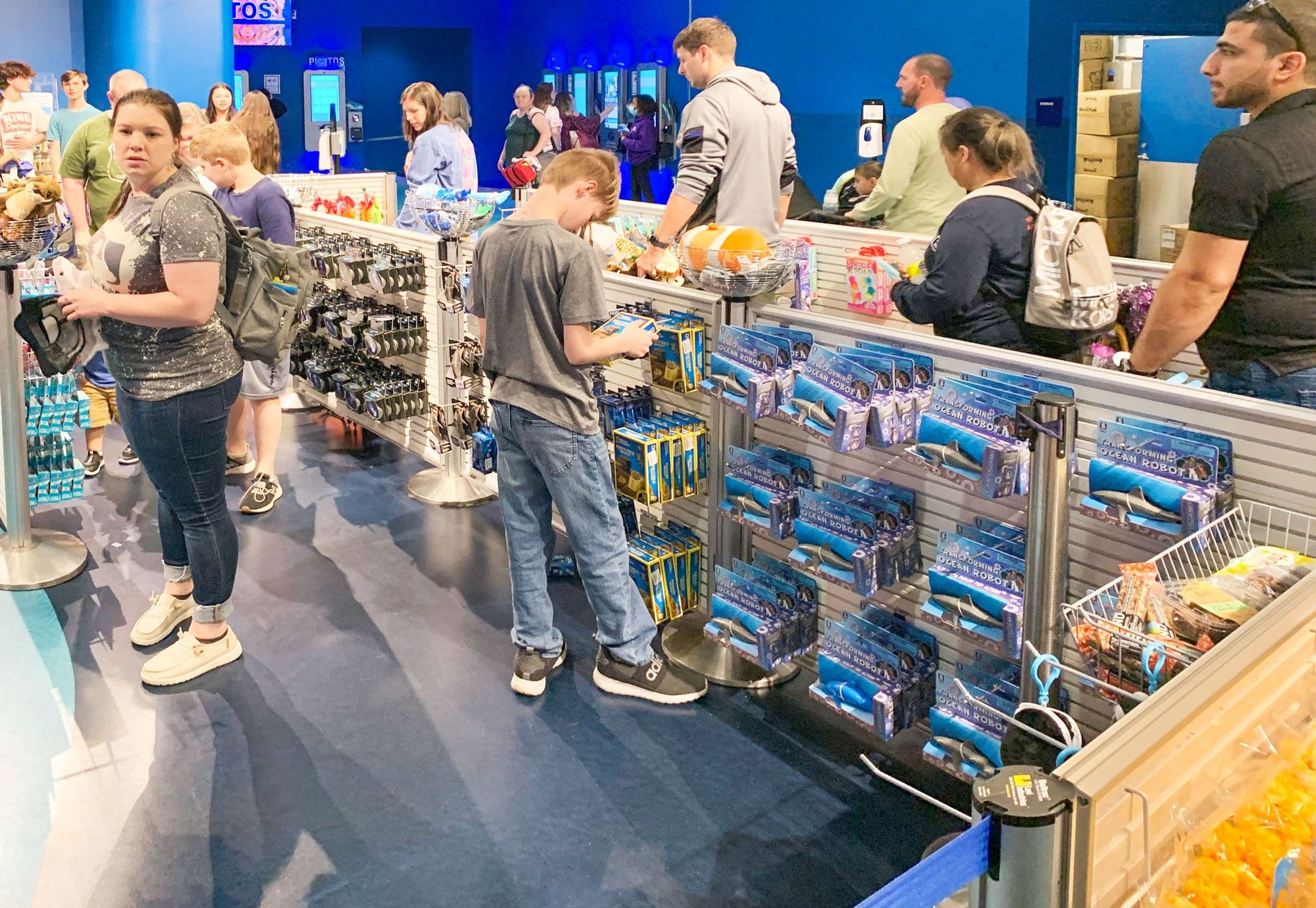 NeXtrac slatwall displays merchandise the gift shop checkout queue at the Georgia Aquarium.