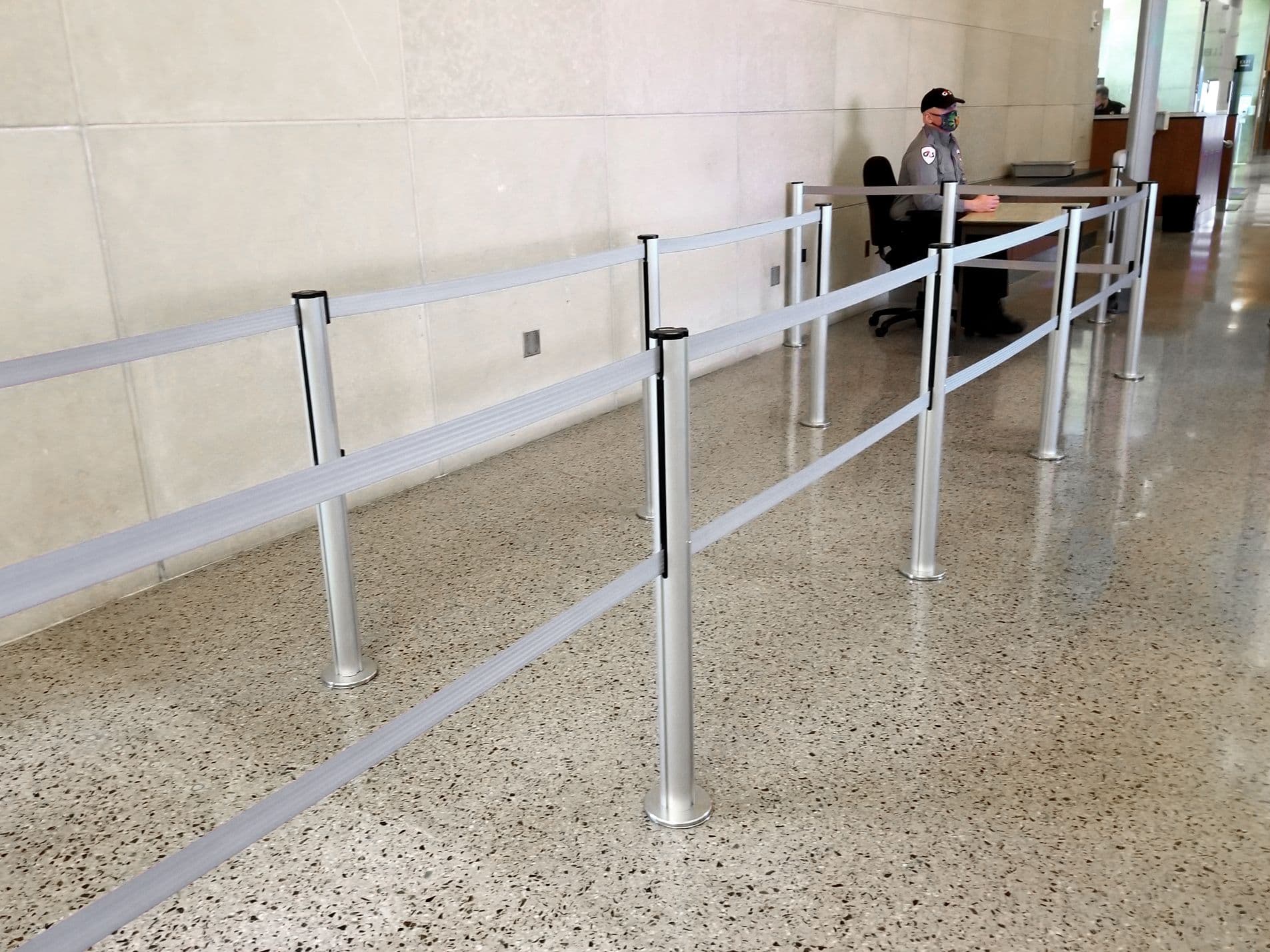 Magnetic Beltrac stanchions with a low second belt guide visitors through the Seattle Municipal Court lobby.