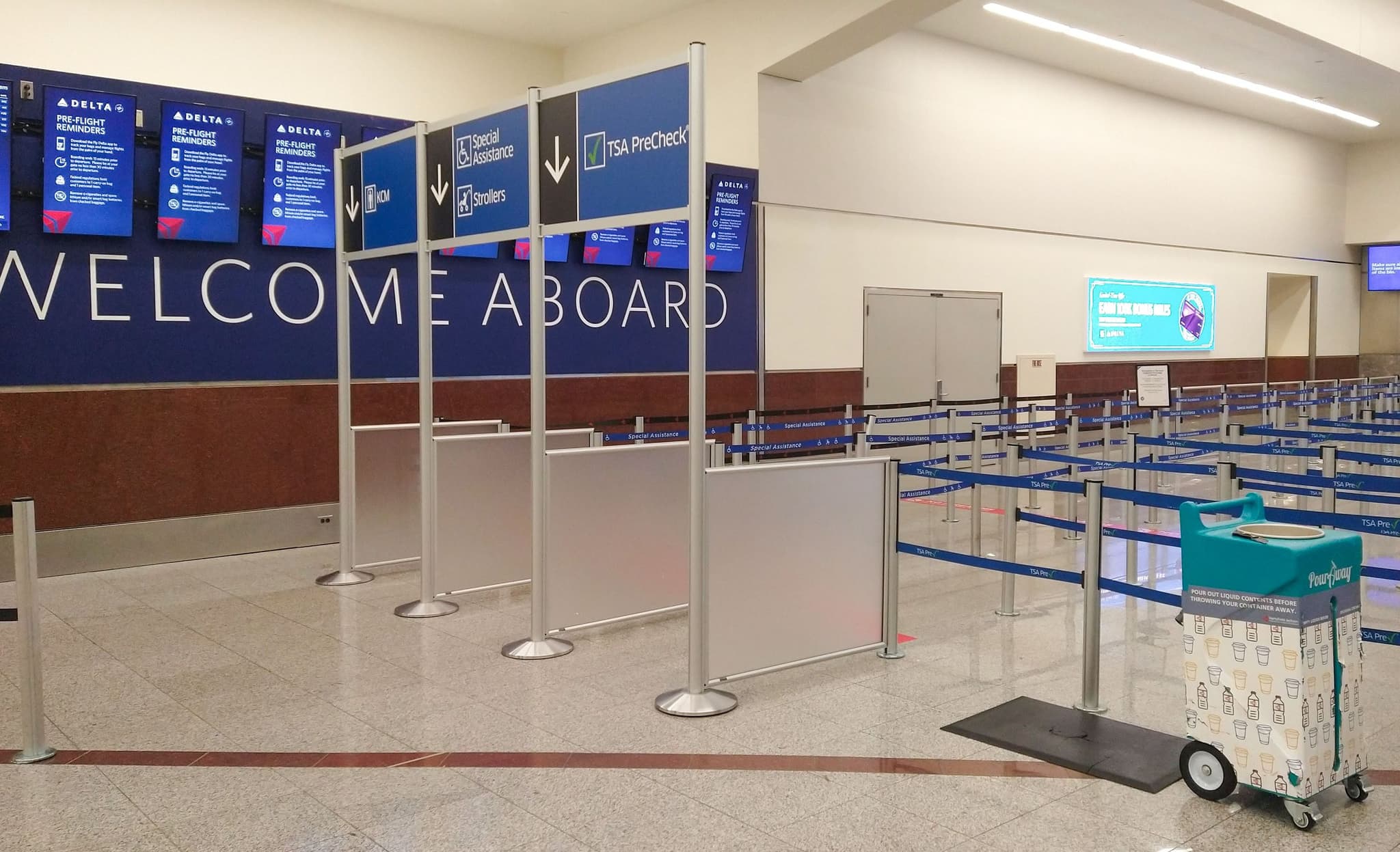 Overhead signs mark the entrance to the security queues at Hartsfield-Jackson Atlanta International Airport.
