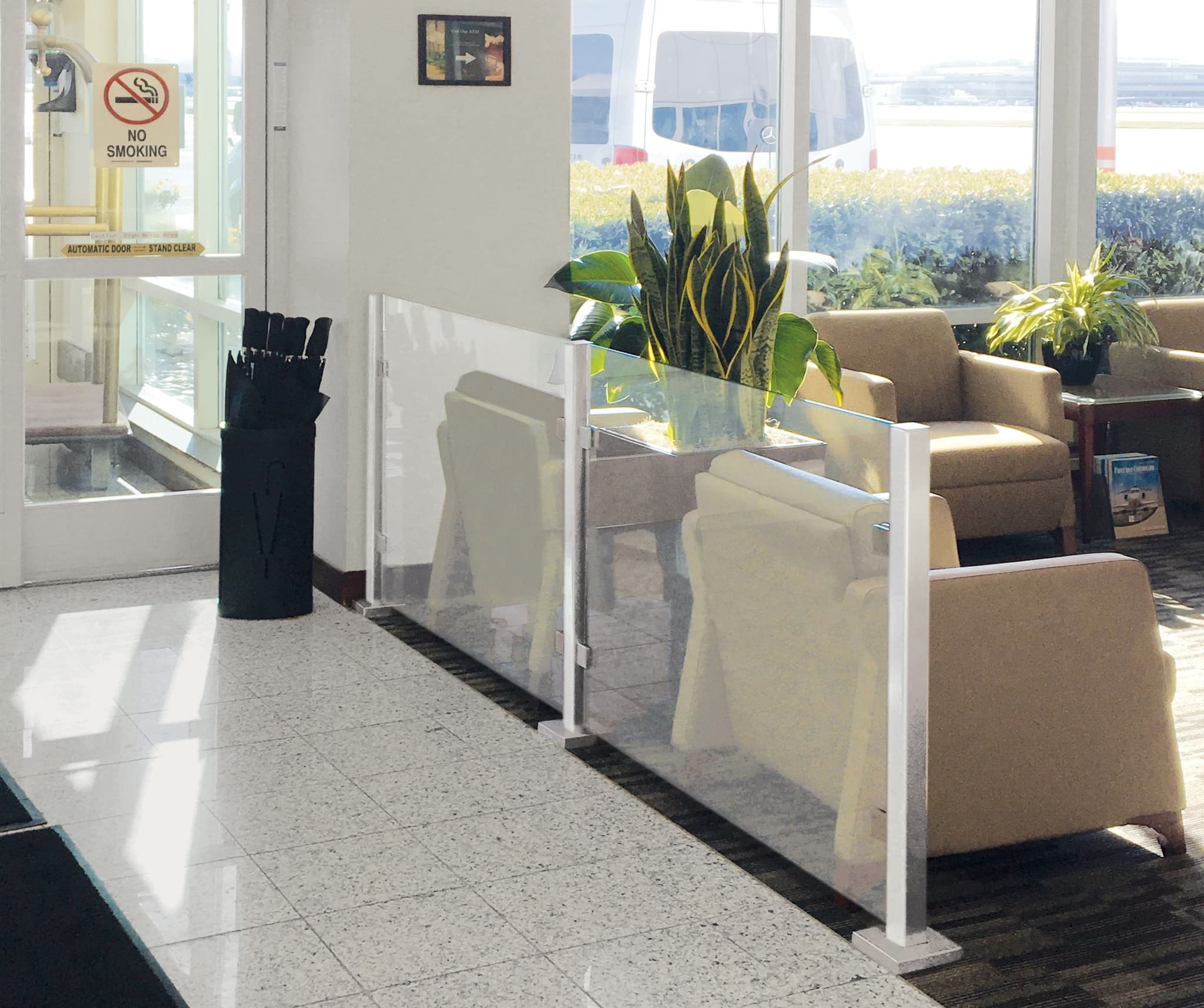 A short Architectural Partition Wall divides the waiting area at the Signature Aviation terminal in San Diego.