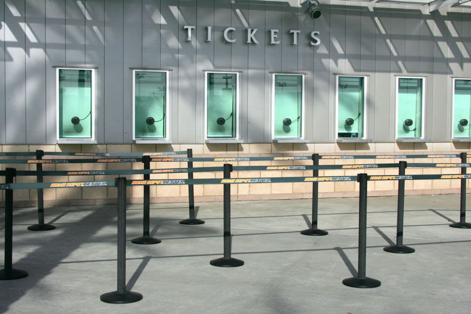 Beltrac retractable belt stanchions form the ticket queue outside a stadium.