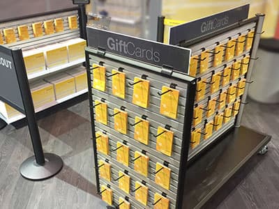 How to Use Merchandising Fixtures to Increase Profit From Your Checkout Queue