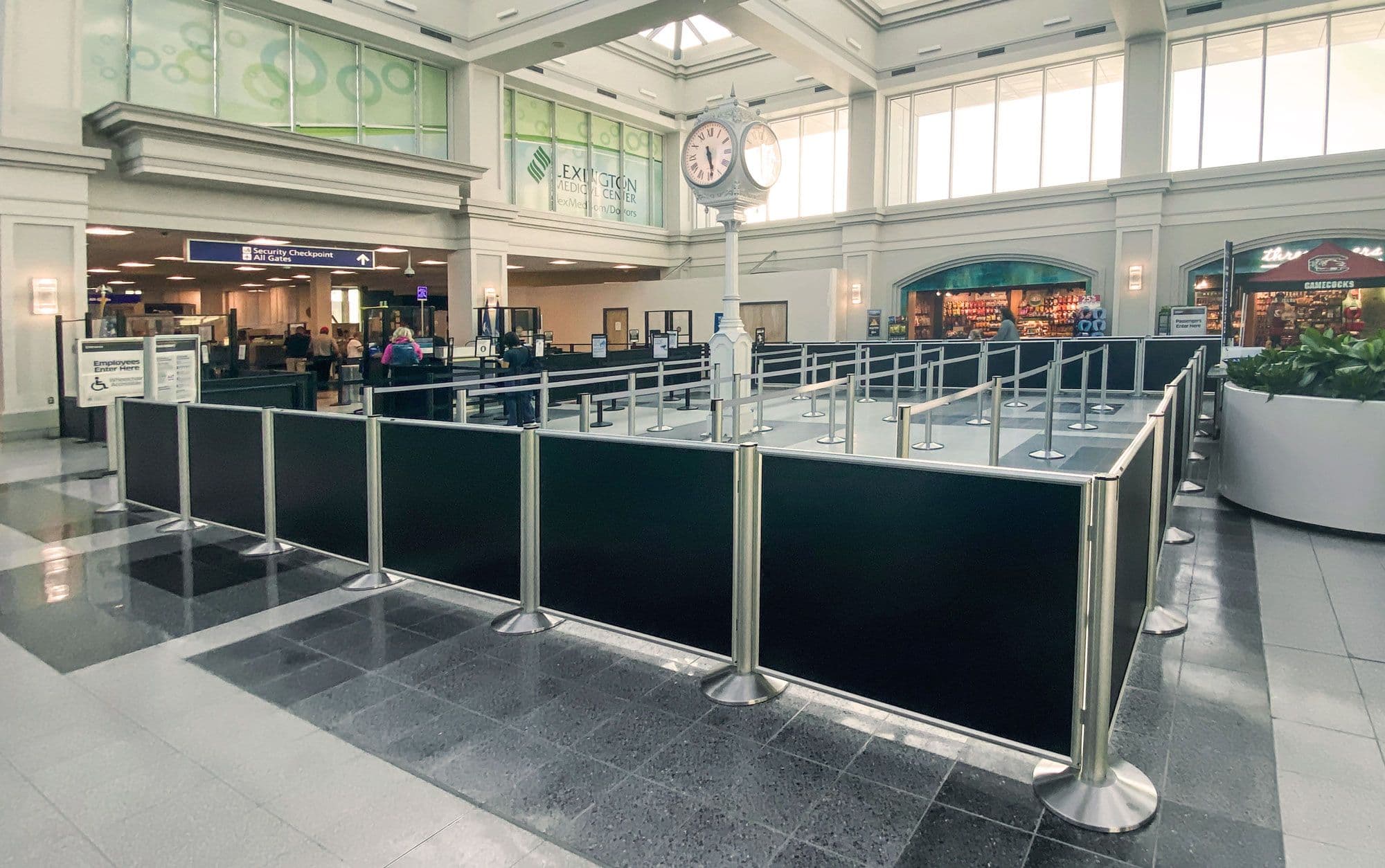 Airport queue with post and panel barriers