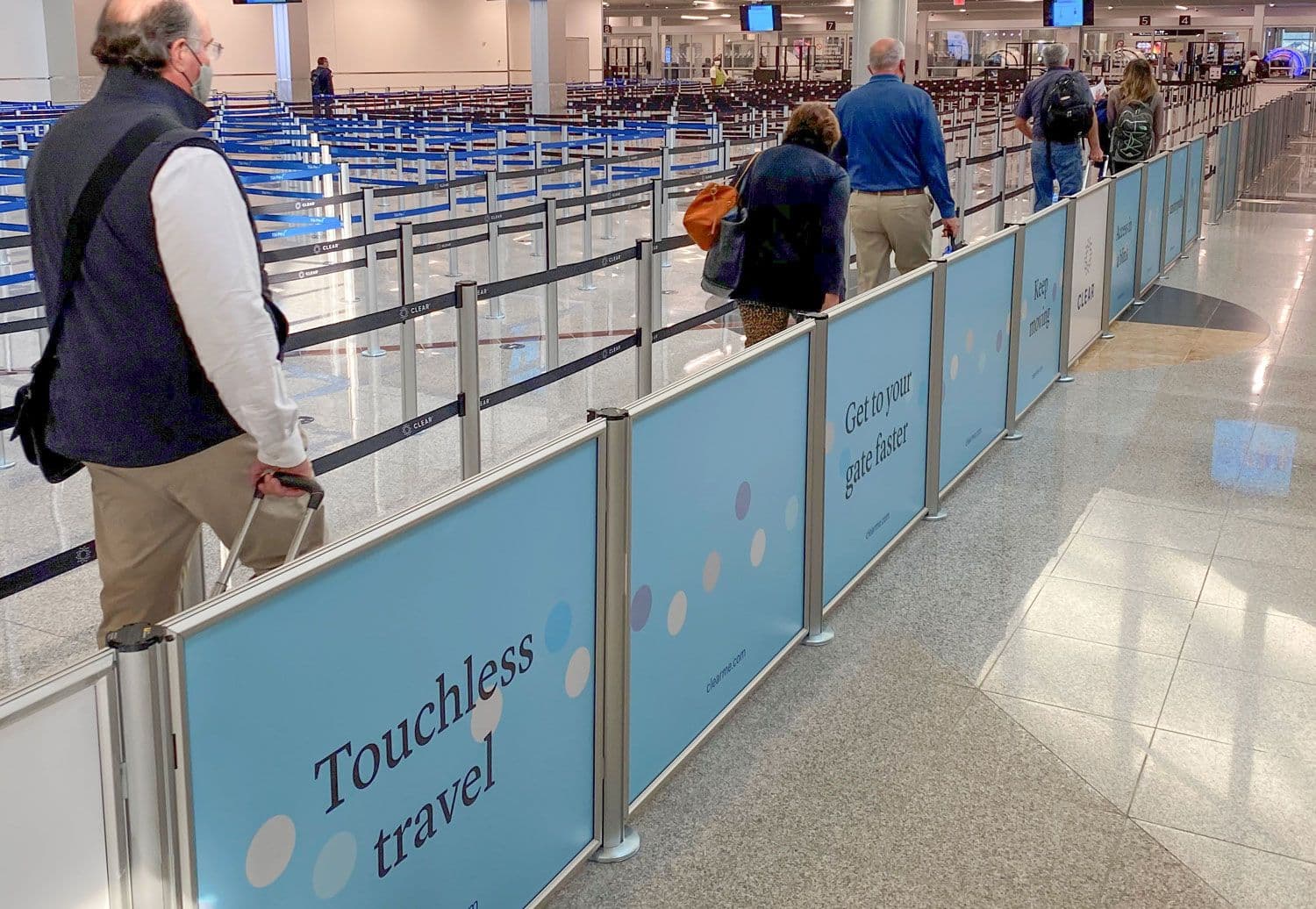 Post and Panel barriers with printed graphics line the security queue at Hartsfield-Jackson Atlanta International Airport.