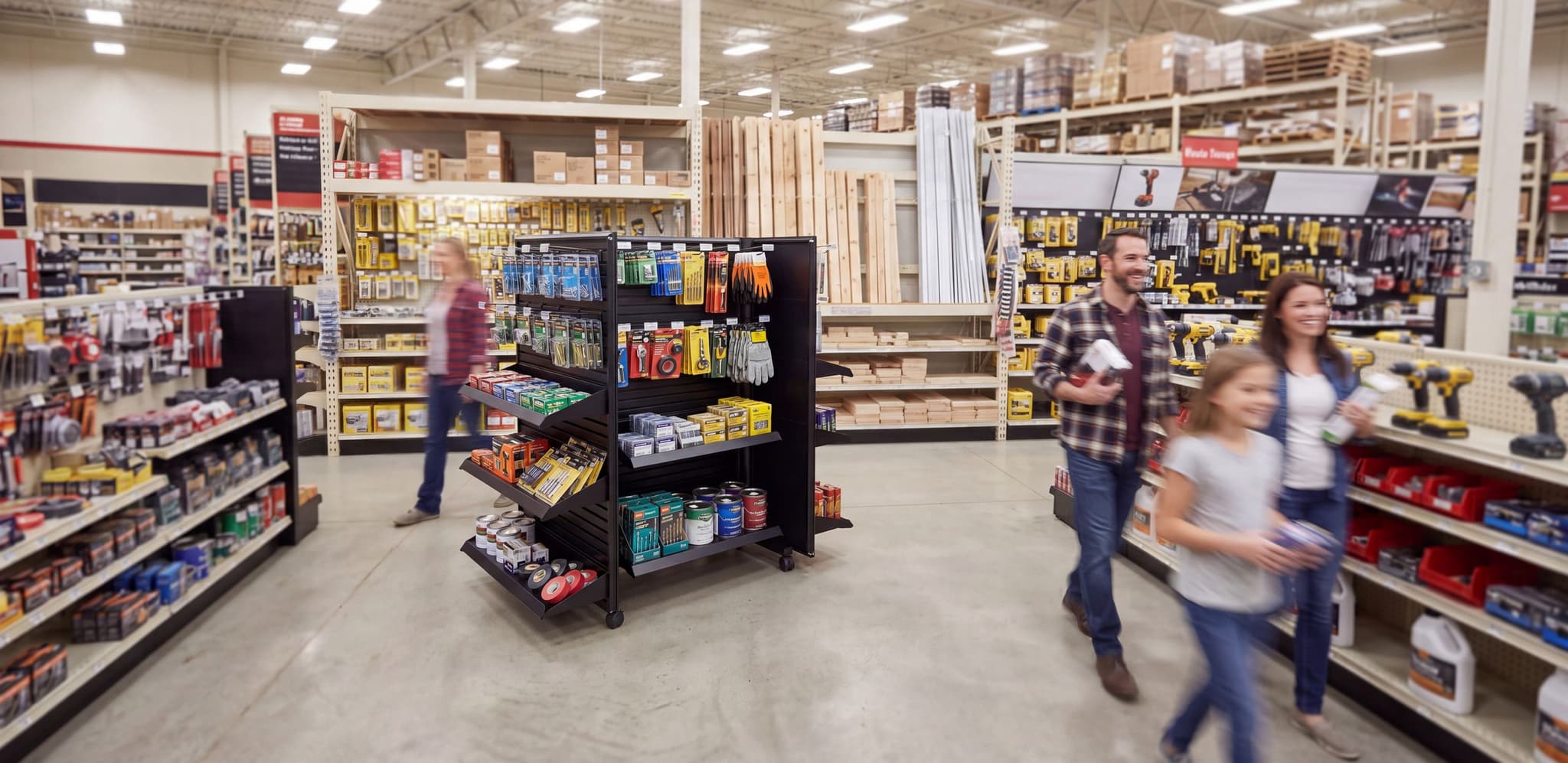 Mobile slatwall gondola in a hardware store aisle