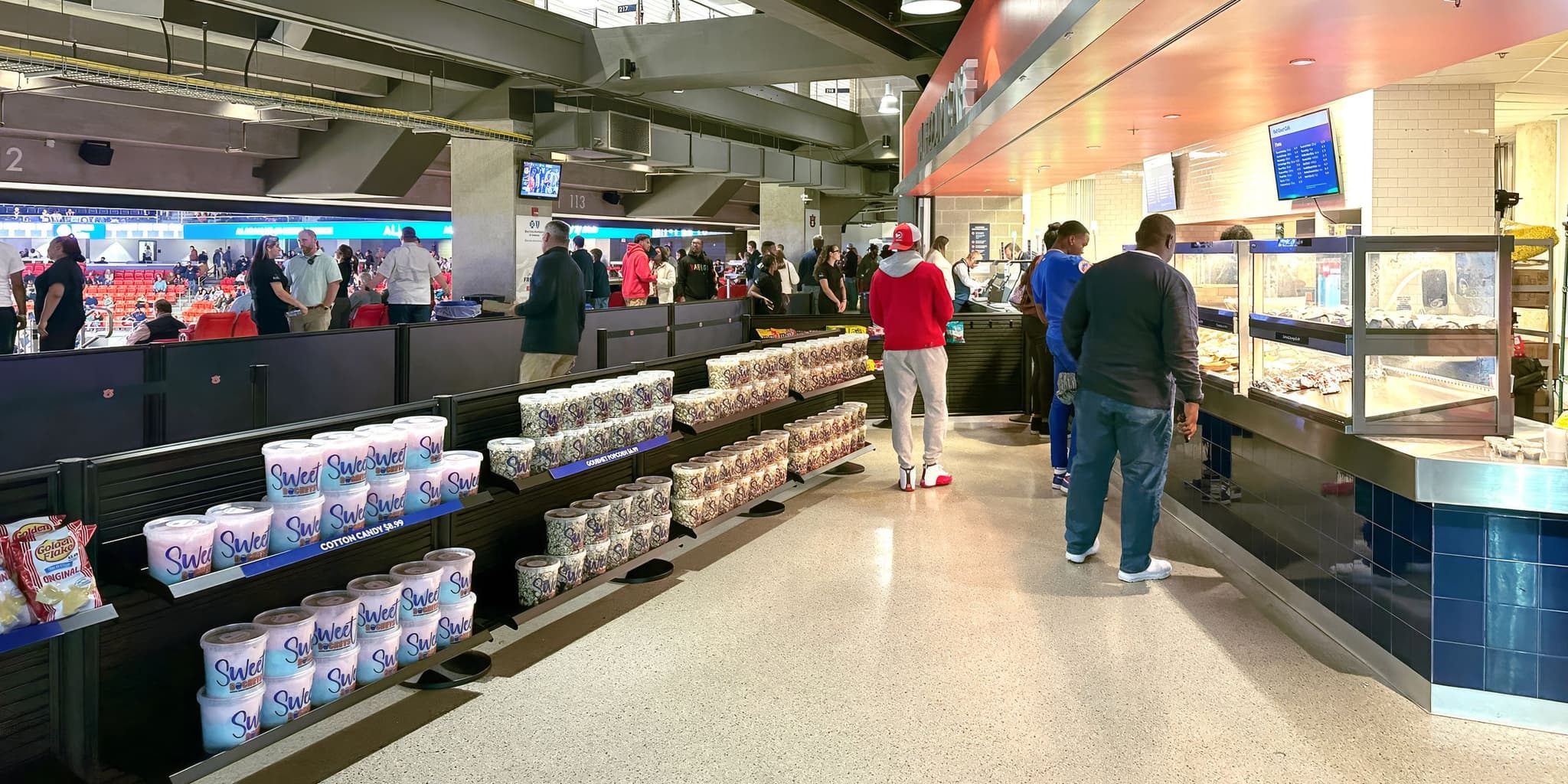 Slatwall Display in the checkout queue at the Auburn Stadium food concesiion